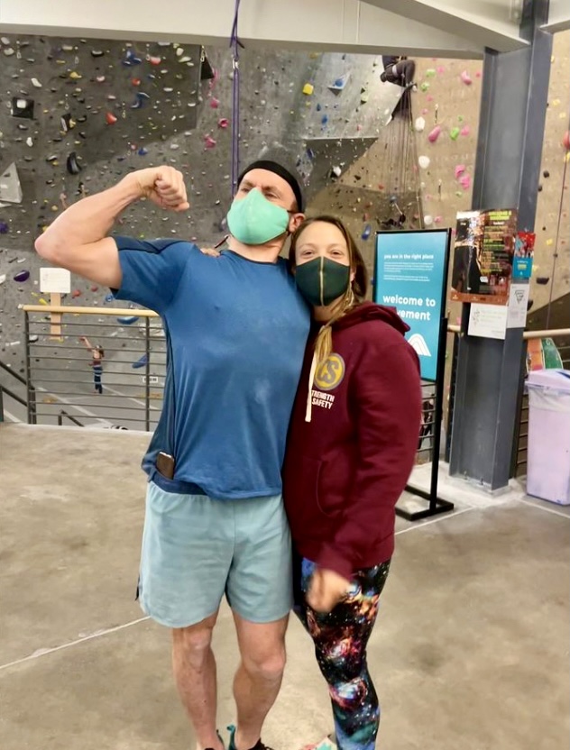 Climbing Coach Chrissy illustrates how to look jacked: stand next to someone much smaller than you, and make sure to have small diameter wrists