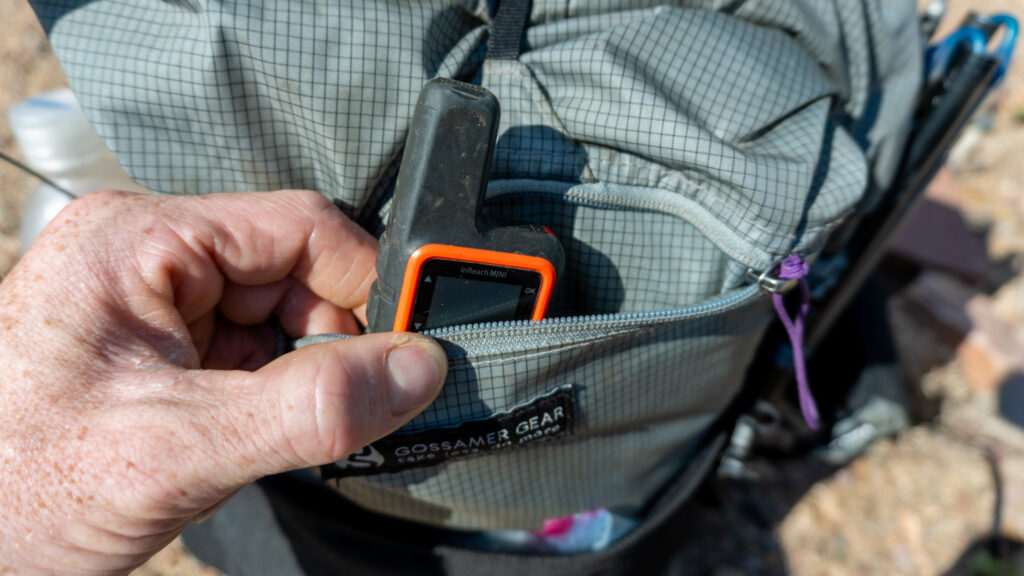 The small center zipper pocket is a great place to put small items like electronics