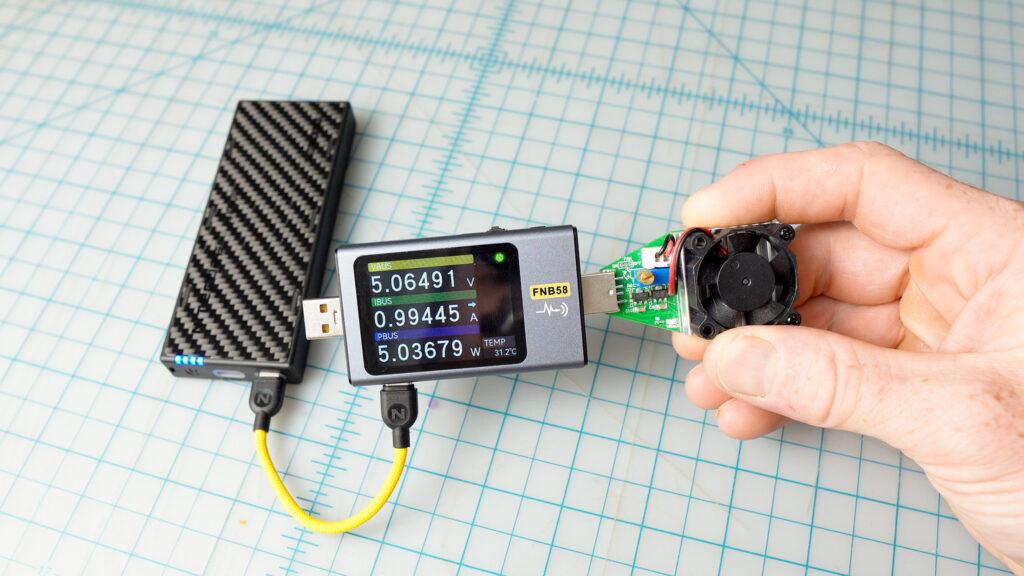 An at-home discharge test was performed using an inline USB power meter and a dummy load totaling 5W